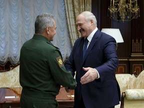 Belarusian President Alexander Lukashenko meets Russian Defence Minister Sergei Shoigu in Minsk, Belarus September 16, 2020.