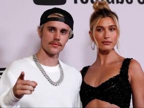 Justin Bieber and his wife, Hailey Baldwin, pose at the premiere for the documentary television series "Justin Bieber: Seasons" in Los Angeles January 27, 2020.
