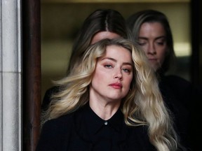 Actor Amber Heard leaves the High Court in London, Britain July 28, 2020.