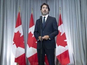 CP-Web.  Prime Minister Justin Trudeau speaks with the media before the first day of a Liberal cabinet retreat in Ottawa, Monday September 14, 2020.
