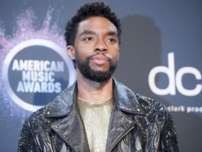 Chadwick Boseman poses backstage at the American Music Awards in L.A. Nov. 24, 2019.