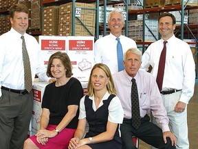 Liz Uihlein, seated at left, and husband Dick, seated at right, founders of ULine, Inc.