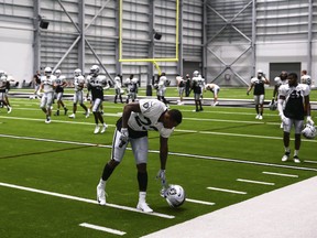 Las Vegas Raiders safety Damarious Randall gets ready to stretch during an NFL football training camp practice Wednesday, Aug. 26, 2020, in Henderson, Nev.