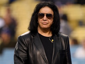 Gene Simmons makes his way on to the field to sing the National Anthem before the game between the Atlanta Braves and the Los Angeles Dodgers at Dodger Stadium on May 7, 2019 in Los Angeles, Calif.