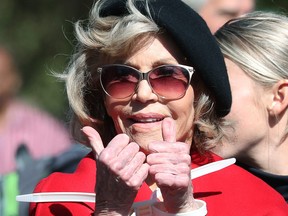 Actress Jane Fonda is arrested for blocking a street in front of the U.S. Capitol during a “Fire Drill Fridays” climate change protest and rally on Capitol Hill, Oct. 18, 2019 in Washington, D.C.