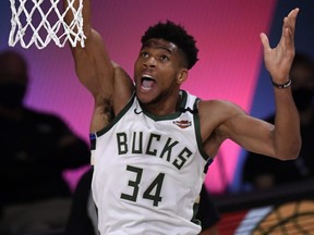 Giannis Antetokounmpo of the Bucks drives to the basket against the Heat in Game 4 of the Eastern Conference Second Round during the 2020 NBA Playoffs at AdventHealth Arena at the ESPN Wide World Of Sports Complex in Lake Buena Vista, Fla., Sept. 6, 2020.