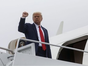 U.S. President Donald Trump talks boards Air Force One as he departs Washington on travel to Illinois and Wisconsin at Joint Base Andrews, Maryland, U.S., September 1, 2020.