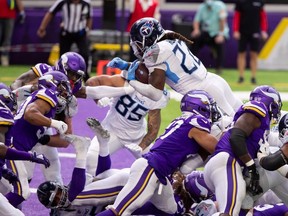 Tennessee Titans running back Derrick Henry scores a touchdown in the third quarter against the Minnesota Vikings at U.S. Bank Stadium.