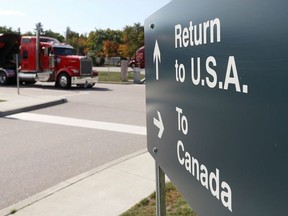 A truck leaves the Canada-United States border crossing at the Thousand Islands Bridge, which remains closed to non-essential traffic to combat the spread of the coronavirus disease (COVID-19) in Lansdowne, Ontario, Canada September 28, 2020.