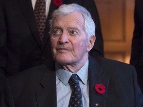 Former prime minister John Turner looks on during a photo op to mark the 150th anniversary of the first meeting of the first Parliament of Canada, in Ottawa on Monday, Nov. 6, 2017.