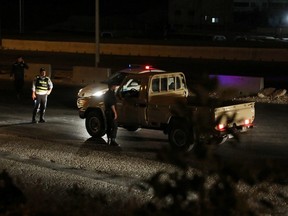 Jordanian police close the highway between the capital of Amman and the city of Zarqa, after of large explosions at a Jordanian army base September 11, 2020.