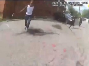 Deon Kay is seen holding what appears to be a gun seconds before he was shot by police in footage captured from a District of Columbia police officer's body camera.