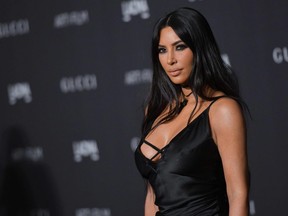 In this file photo taken on November 3, 2018 Kim Kardashian-West arrives for the 2018 LACMA Art+Film Gala at the Los Angeles County Museum of Art in Los Angeles.