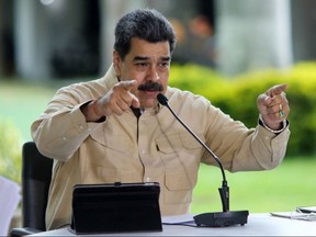 Handout picture released by the Venezuelan Presidency showing Venezuela's President Nicolas Maduro speaking during a televised announcement from Miraflores Presidential Palace in Caracas on September 6, 2020.