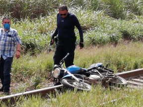 A motorcycle is seen at the site where the body of journalist Julio Valdivia was found in Tezonapa, Veracruz, Mexico, September 9, 2020.