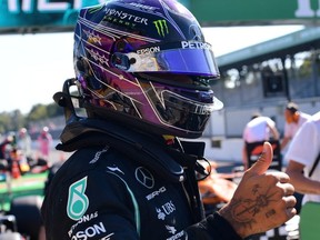 Formula One F1 - Italian Grand Prix - Autodromo Nazionale Monza, Monza, Italy - September 5, 2020  Mercedes' Lewis Hamilton reacts after qualifying in pole position.