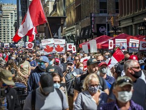 Gun owners from across the country gathered on Parliament Hill in Ottawa and held a march, organized by the Canadian Coalition for Firearm Rights, Saturday, Sept. 12, 2020.