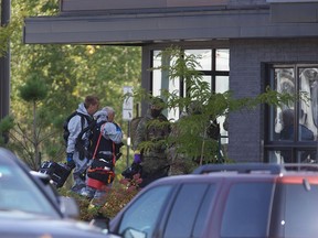 Longueuil police are assisting the RCMP with the execution of a warrant. A condo building was evacuated as a precaution.