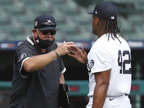 Tigers manager Ron Gardenhire (left) celebrates with starting pitcher Gregory Soto (right) after the game against the Twins at Comerica Park in Detroit, Aug. 30, 2020.