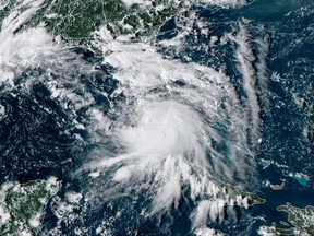 This RAMMB/NOAA satellite image shows Tropical Storm Sally south of Florida on September 12, 2020.
