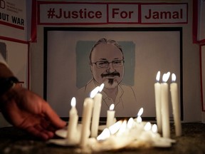 The Committee to Protect Journalists and other press freedom activists hold a candlelight vigil in front of the Saudi Embassy to mark the anniversary of the killing of journalist Jamal Khashoggi at the kingdom's consulate in Istanbul in Washington, U.S., October 2, 2019.