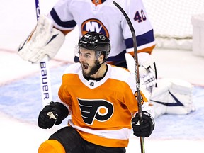 Philadelphia Flyers' Scott Laughton celebrates after scoring the game-winning goal against the New York Islanders during the first overtime period to win Game 5 against the New York Islanders on Tuesday night in Toronto.