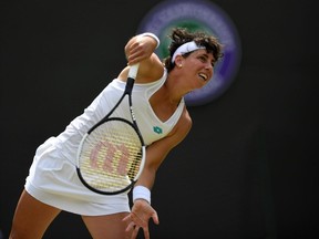 Spain's Carla Suarez Navarro in action during her fourth-round match against Serena Williams of the U.S. at Wimbledon in 2019.