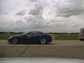 On July 9, Alberta RCMP pulled over a 2019 Tesla Model S on Highway 2 near Ponoka, that was travelling at speeds up to 150 km/h and appeared to be self-driving with both seats reclined and two people inside the car sleeping. Image supplied by Alberta RCMP.