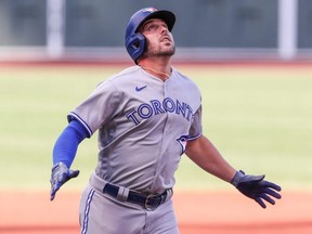 Blue Jays third baseman Travis Shaw celebrates after hitting a home run during the second inning against the Red Sox at Fenway Park in Boston, Friday, Sept. 4, 2020.