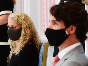 Governor General Julie Payette and Prime Minister Justin Trudeau look on during a swearing in ceremony following a cabinet shuffle at Rideau Hall in Ottawa on Tuesday, August 18, 2020.