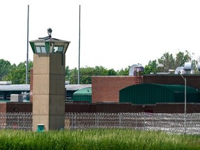 A correction officer keeps watch from a tower at The Federal Corrections Complex in Terre Haute, Indiana, U.S. May 22, 2019.
