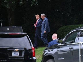 U.S. President Donald Trump and White House Chief of Staff Mark Meadows depart the White House en route to the Trump International Hotel in Washington, U.S., September 12, 2020.