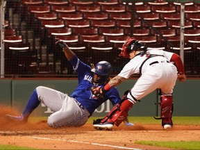 Blue Jays’ Vladimir Guerrero Jr. is tagged out at home by Red Sox catcher Christian Vazquez during the fourth inning on Thursday night at Fenway Park in Boston. The Jays have performed poorly on the basepaths this season.