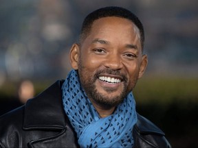 In this file photo taken on January 6, 2020 Will Smith poses at the 'Bad Boys For Life' launching photocall in Paris, in front of the Eiffel Tower.