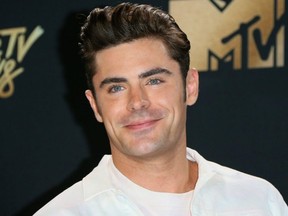 Actor Zac Efron arrives for the 2017 MTV Movie & TV Awards at the Shrine Auditorium in Los Angeles, May 7, 2017.