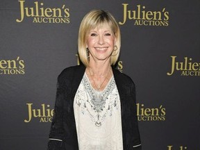 Olivia Newton-John attends the VIP reception for upcoming "Property of Olivia Newton-John Auction Event at Juliens Auctions on October 29, 2019 in Beverly Hills, California.