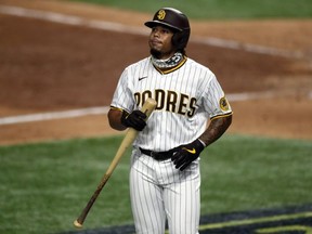 Luis Campusano of the San Diego Padres reacts after striking out during the eighth inning against the Los Angeles Dodgers in Game Three of the National League Division Series at Globe Life Field on October 08, 2020 in Arlington, Texas.