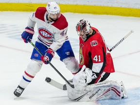 Ottawa Senators goaltender Craig Anderson (41) makes a save against Montreal Canadiens center Nate Thompson (44) during NHL action at the Canadian Tire Centre in Ottawa on Saturday February 22, 2020.