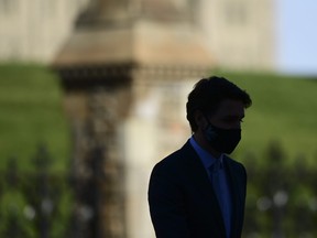 Prime Minister Justin Trudeau makes his way to provide an update on the COVID pandemic in Ottawa on Tuesday, Oct. 27, 2020.