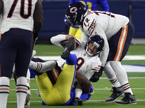 Bears quarterback Nick Foles is sacked by linebacker Terrell Lewis of the Los Angeles Rams on Monday.