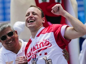 Joey Chestnut celebrates after winning the annual Nathan's Hot Dog Eating Contest on July 4, 2018 in the Coney Island neighborhood of the Brooklyn borough of New York City.