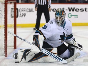 San Jose Sharks goaltender Aaron Dell makes a toe save against Winnipeg Jets centre Andrew Copp in Winnipeg on Tues., March 12, 2019.