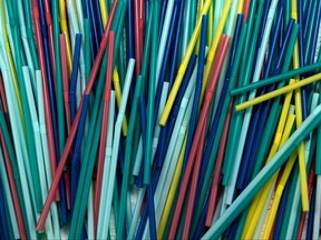 This file photo taken on August 12, 2018 shows plastic straws, in a studio, in Paris.