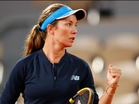 Danielle Collins of the U.S. reacts as she plays against Spain's Garbine Muguruza during their women's singles third round tennis match on Day 7 of The Roland Garros 2020 French Open tennis tournament in Paris on Oct. 3, 2020.