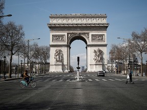 A view shows the deserted Arc de Triomphe as lockdown is imposed to slow the spreading of the coronavirus disease (COVID-19) in Paris, France, March 18, 2020.