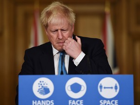 Prime Minister Boris Johnson speaks during a virtual press conference on the latest coronavirus data at Downing Street on October 16, 2020 in London.