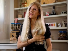 Eylon Nuphar, an Israeli performing artist who chose not to have her breasts reconstructed after a double mastectomy, gestures during her interview with Reuters in Tel Aviv, Israel October 21, 2020.