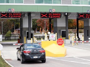 A car waits to enter a checkpoint to enter Canada at the Canada-United States border crossing at the Thousand Islands Bridge September 28, 2020.