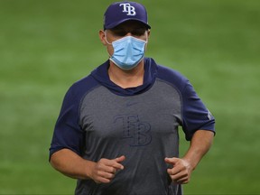 Tampa Bay Rays manager Kevin Cash heads back to the dugout after bringing in Nick Anderson (not pictured) to replace Blake Snell (not pictured) against the Los Angeles Dodgers during Game 6 of the World Series.