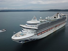 This file photo shows an aerial view of the "Caribbean Princess" arriving to the port of Colon, in Panama, on May 28, 2020.